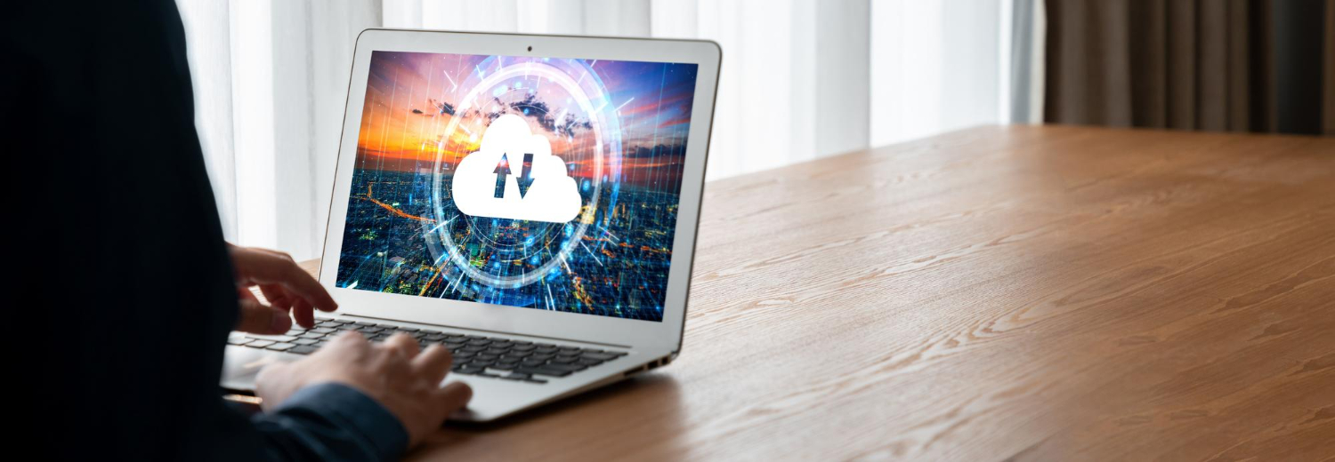 man downloads file to laptop